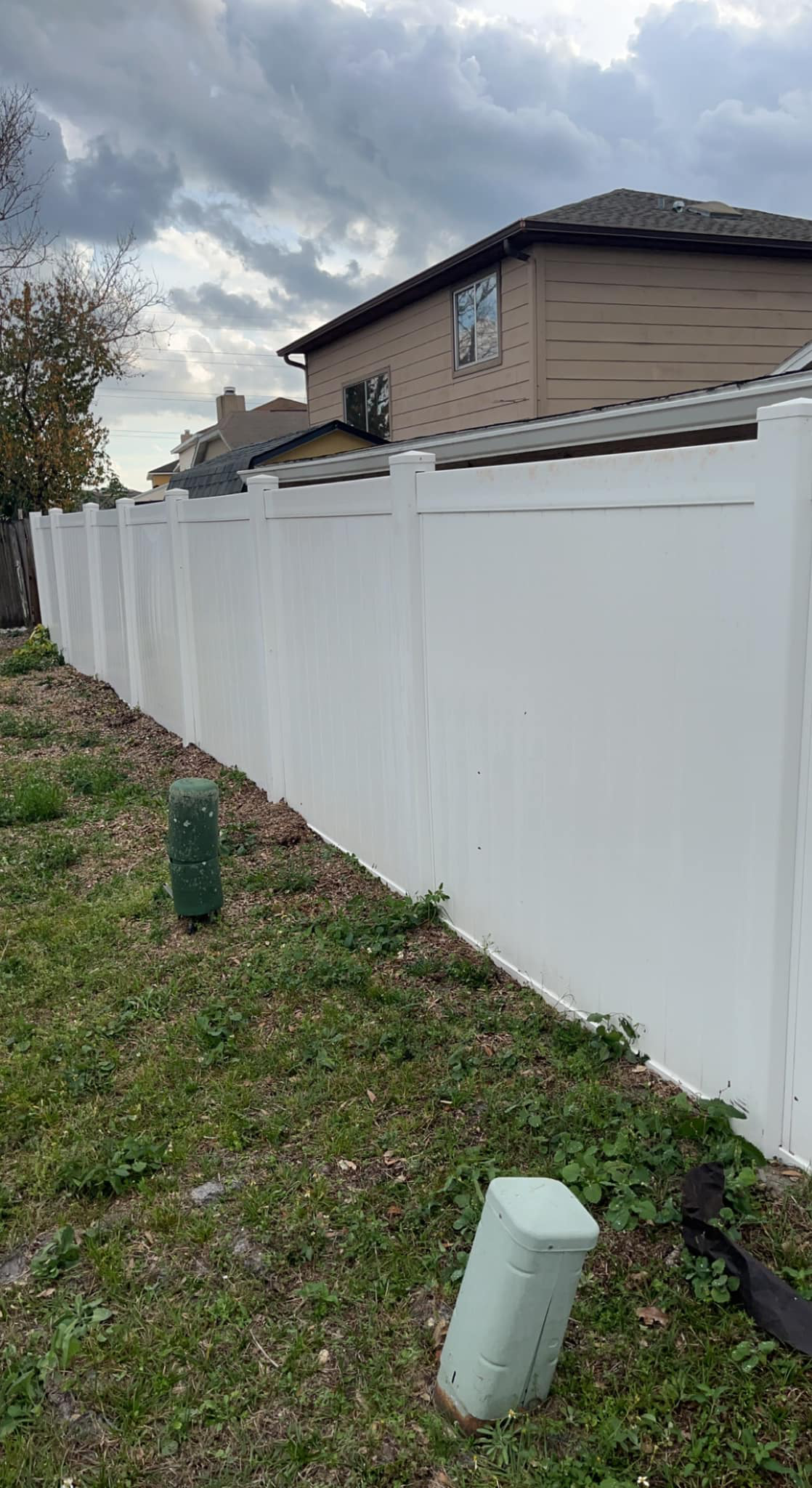 White PVC fence after soft wash — Jay's Pressure Washing